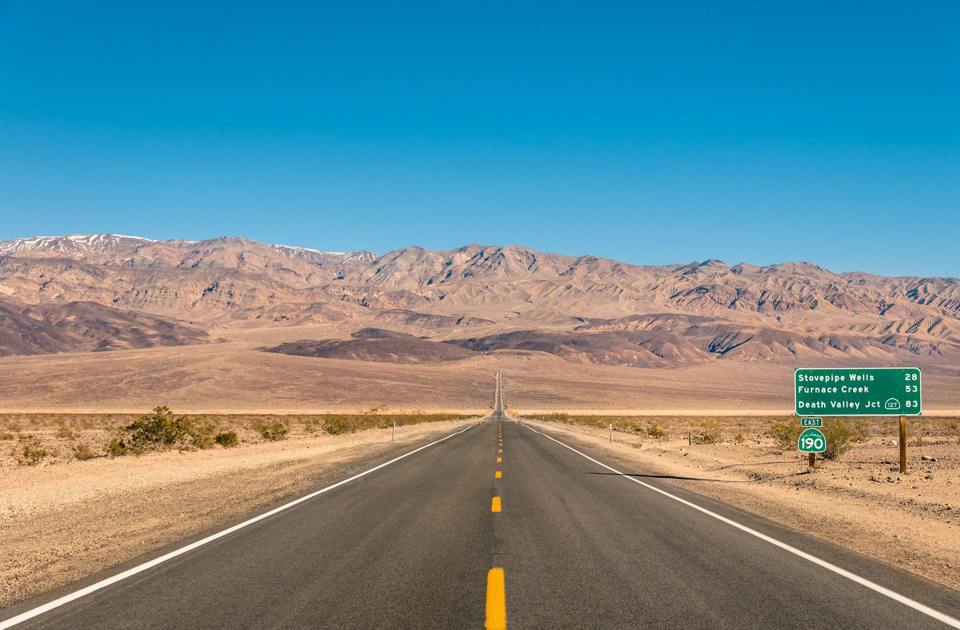 Death Valley, California - Empty infinite Road in the Desert